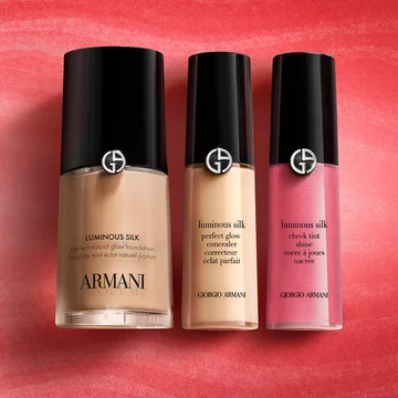 A model wears an Armani beauty foundation shade in the Virtual Try-On interface
