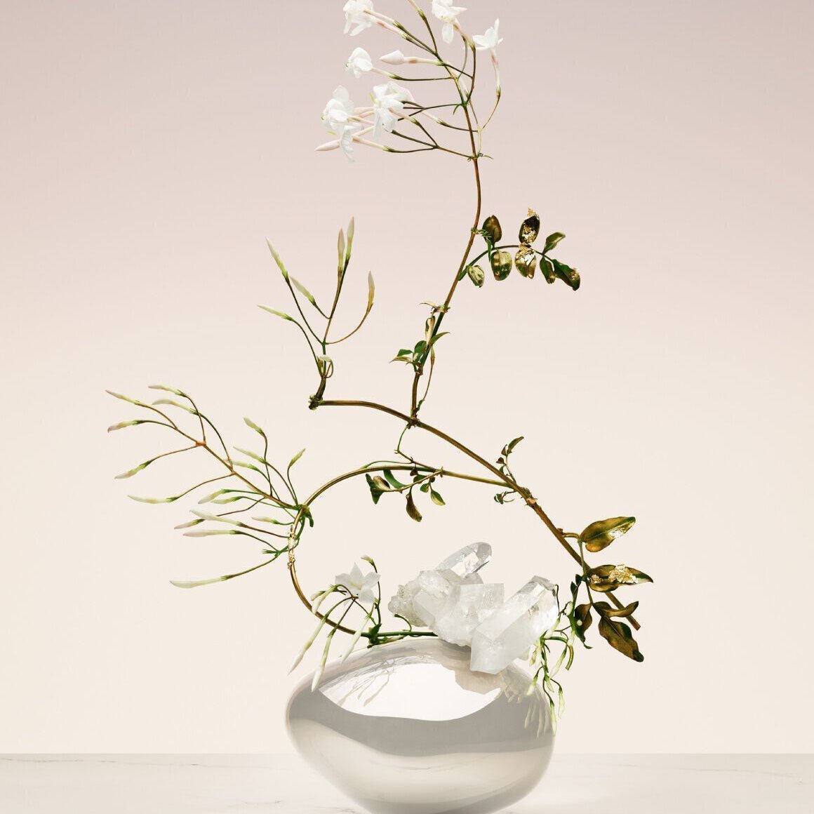 Armani/Prive Blanc Kogane: artistic ikebana arrangement with delicate white florals, evoking purity and elevated craftsmanship.