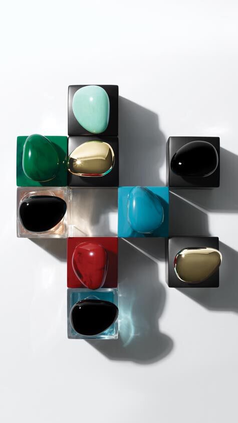 A collection of Armani/Prive bottles portrayed from a top view