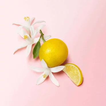 Orange Blossom, Tuberose, and Jasmine on pink background
