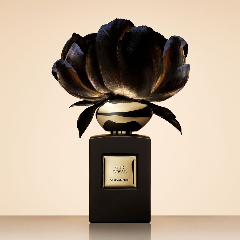 Armani/Prive Oud Royal: perfume bottle crowned with a dramatic metallic flower.