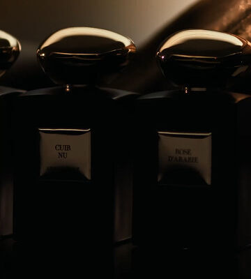 Display of Armani/Prive Les 1001 Nuits collection movie with different fragrances and ingredients in a cinematic setting.