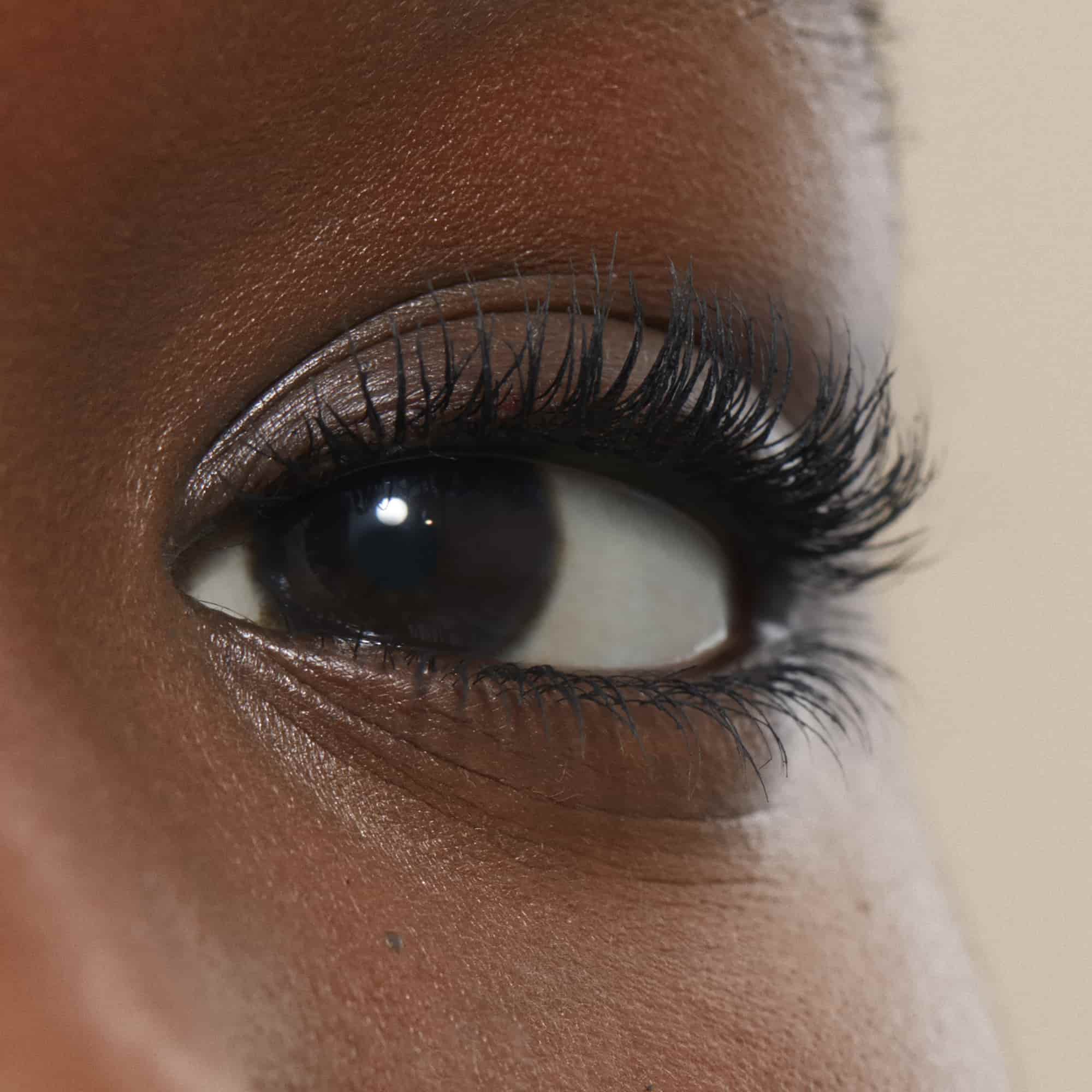 A closeup of a model wearing Classico Mascara by Armani Beauty